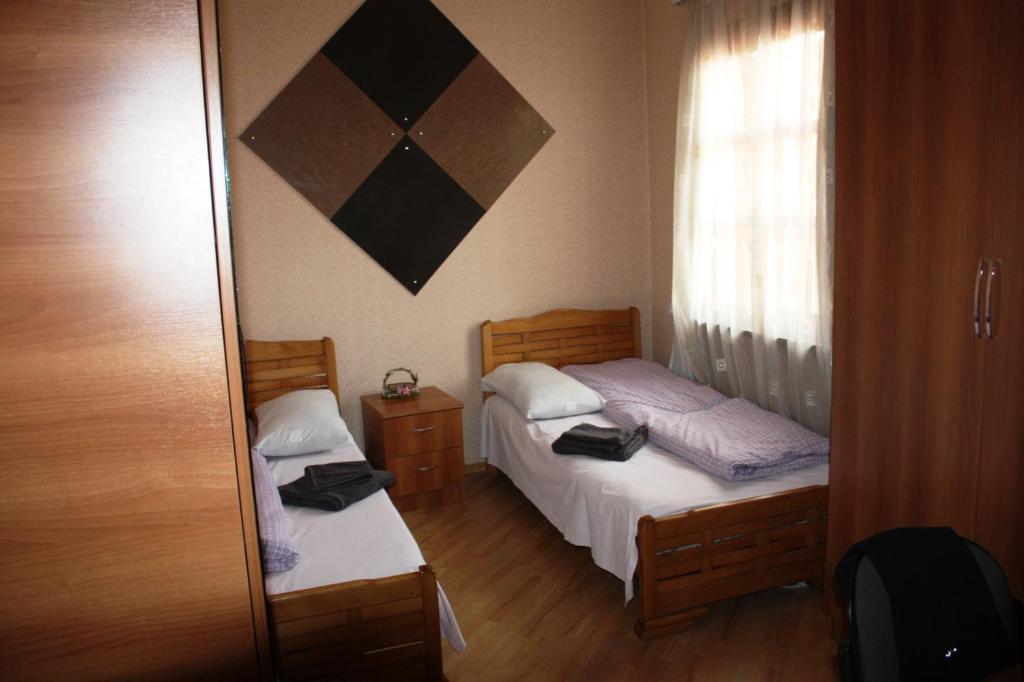 Babilina Hotel Тбилиси Стая снимка